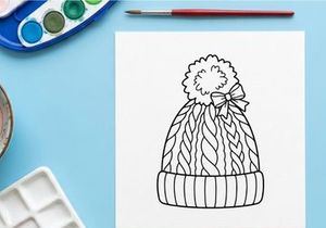 Halaman mewarnai topi beanie musim dingin untuk anak-anak dan dewasa dengan pola rajutan kabel
