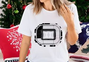 Black and white architectural drawing of a large oval stadium with seating