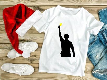 A silhouette of a man holding up a glowing yellow light source in his right hand