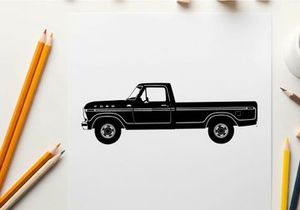 Silhouette of a classic black pickup truck with a long bed