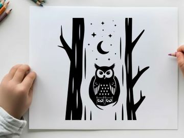 Silhouette of an owl in a forest at night preview picture