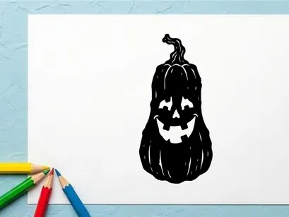 Halloween Jack-o'-lantern with spooky face and candlelight glow