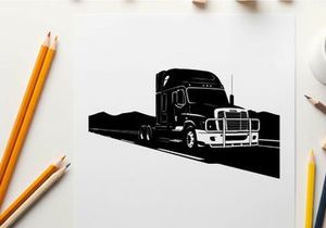 Silhouette of a semi truck on a highway with mountains