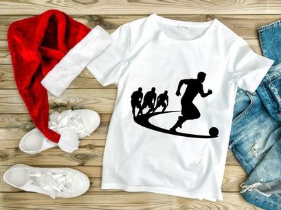 Silhouette of soccer players in action kicking ball with motion trail