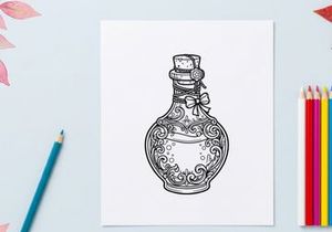 Elegant antique perfume bottle with intricate floral engravings. Vintage glass decanter for luxury fragrance or decorative display.