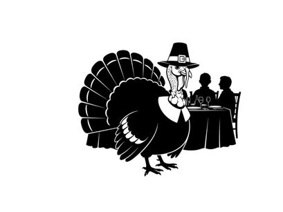 Pilgrim turkey silhouette at thanksgiving dinner table with family