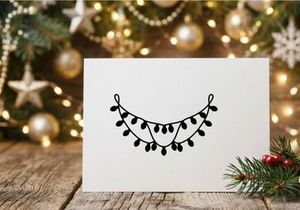 Black silhouette of Christmas string lights isolated on a white background