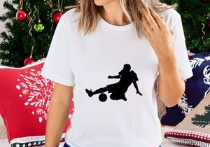 Soccer player in action kicking a ball with dynamic movement and energy