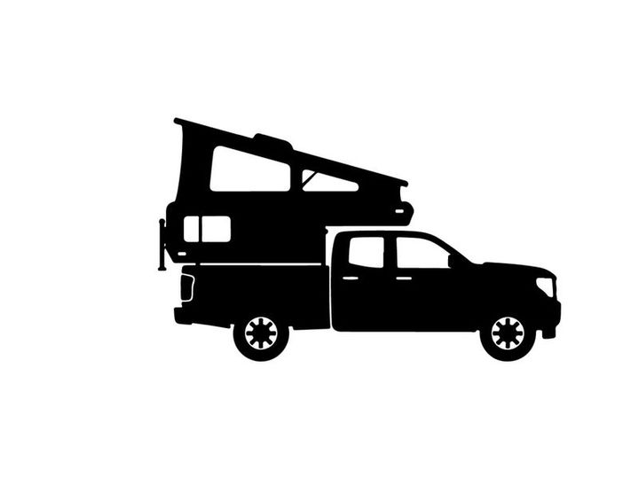 Silhouette of a pickup truck with a camper on the back