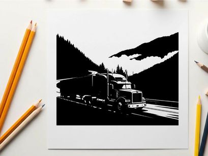 Truck driving through mountains in silhouette
