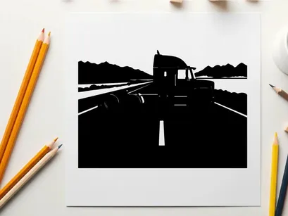 Silhouette of a semi truck driving on a highway with mountains