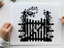 Silhouette of a girl behind a wooden picket fence with flowers