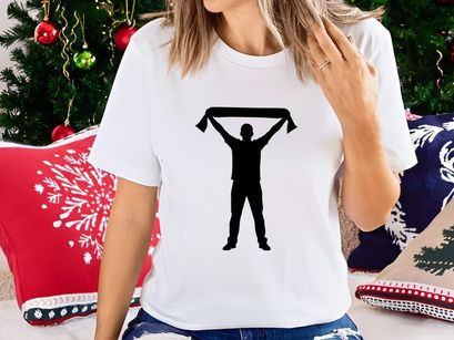 A person holding up a scarf in the air with both hands