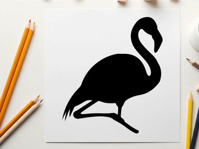 Silhouette of a flamingo standing on one leg