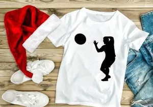 A silhouette of a person catching a ball in mid air with athletic movement and focus