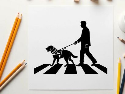 Man and guide dog crossing street in silhouette