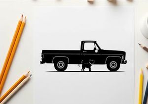Silhouette of a pickup truck with a dog