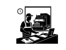 Silhouette of a man in an office with a large truck outside