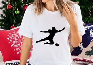 Rugby player kicking a ball in mid action dynamic movement