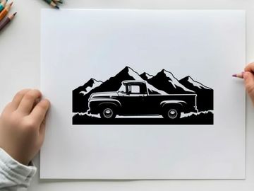 Silhouette of a vintage pickup truck in front of majestic mountain range silhouette preview picture