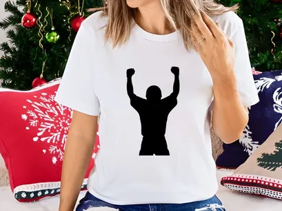 Victorious person silhouette with raised arms