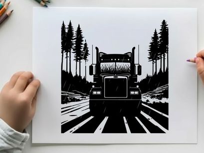 Black silhouette of a semi truck driving down a forest road