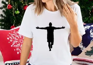Silhouette of a person with outstretched arms in a dynamic pose