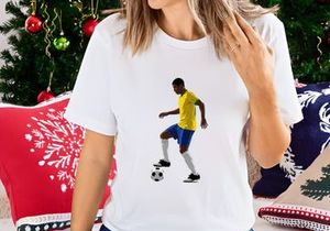 Professional soccer player in action with ball on white background