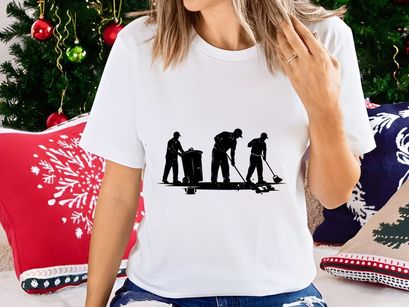 Silhouette of three workers cleaning the street with broom and trash can