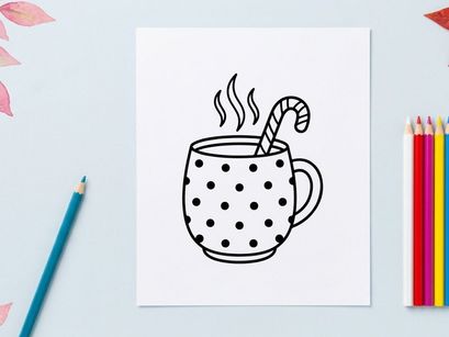 Steaming hot coffee in polka dot mug with candy cane stirrer for festive Christmas morning