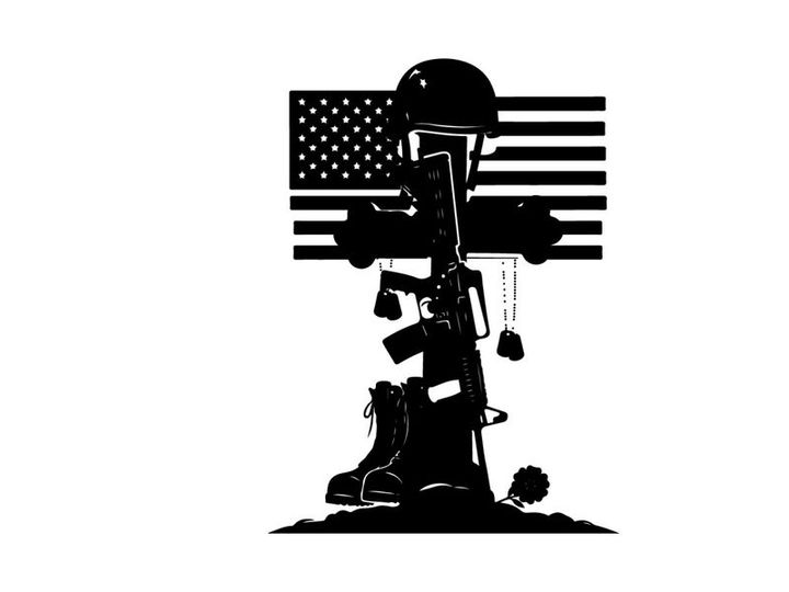 Memorial silhouette of fallen soldier with american flag