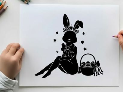 Easter bunny silhouette with crown and basket of eggs
