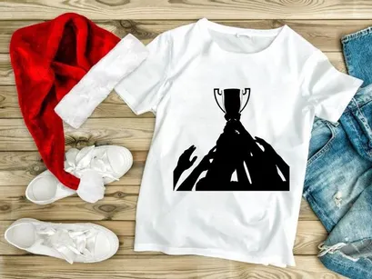 A group of people reaching for a trophy cup in celebration and competition