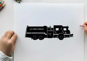Silhouette of a u s forest service truck a large vehicle