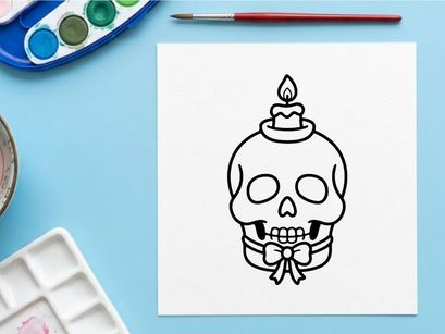 Halloween skull candle holder with lit flame. Spooky decorative ceramic skull for festive home decor and party centerpiece.
