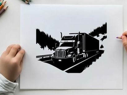 Semi truck silhouette driving on highway through mountains