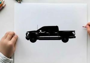Silhouette of a pickup truck against a white background