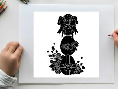 Silhouette of easter eggs with bow and flowers