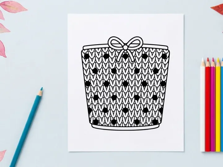 Christmas gift box icon with knitted texture and polka dot pattern in black and white line art