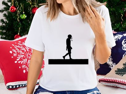 Silhouette of a person walking alone in a protective suit with a gas mask