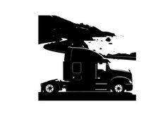 Silhouette of a semi truck on a coastal road with mountains