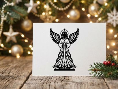 Black and white angel silhouette with wings and halo for Christmas holiday design